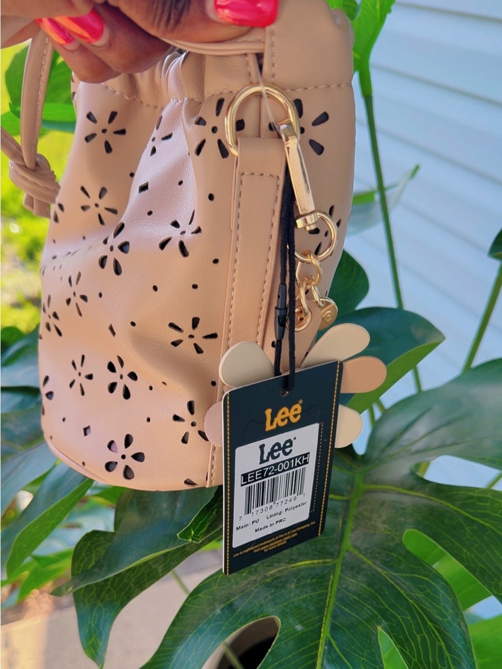 Lee Mini Laser-Cut Drawstring Bucket Bag in Soft Beige